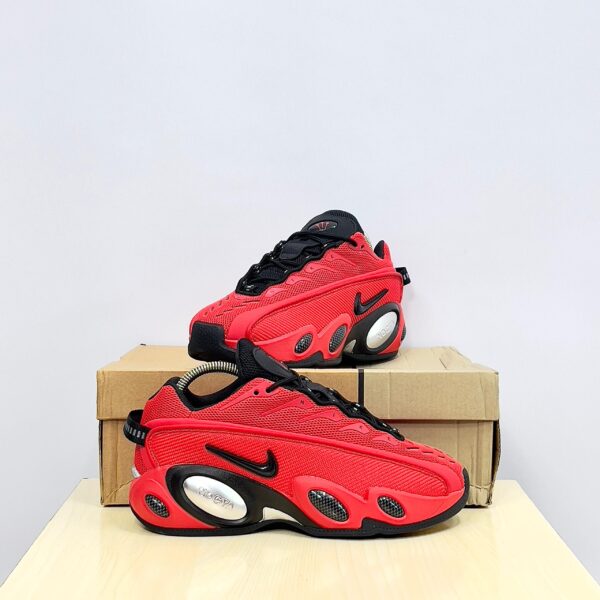 The NOCTA x Nike Glide “Bright Crimson”