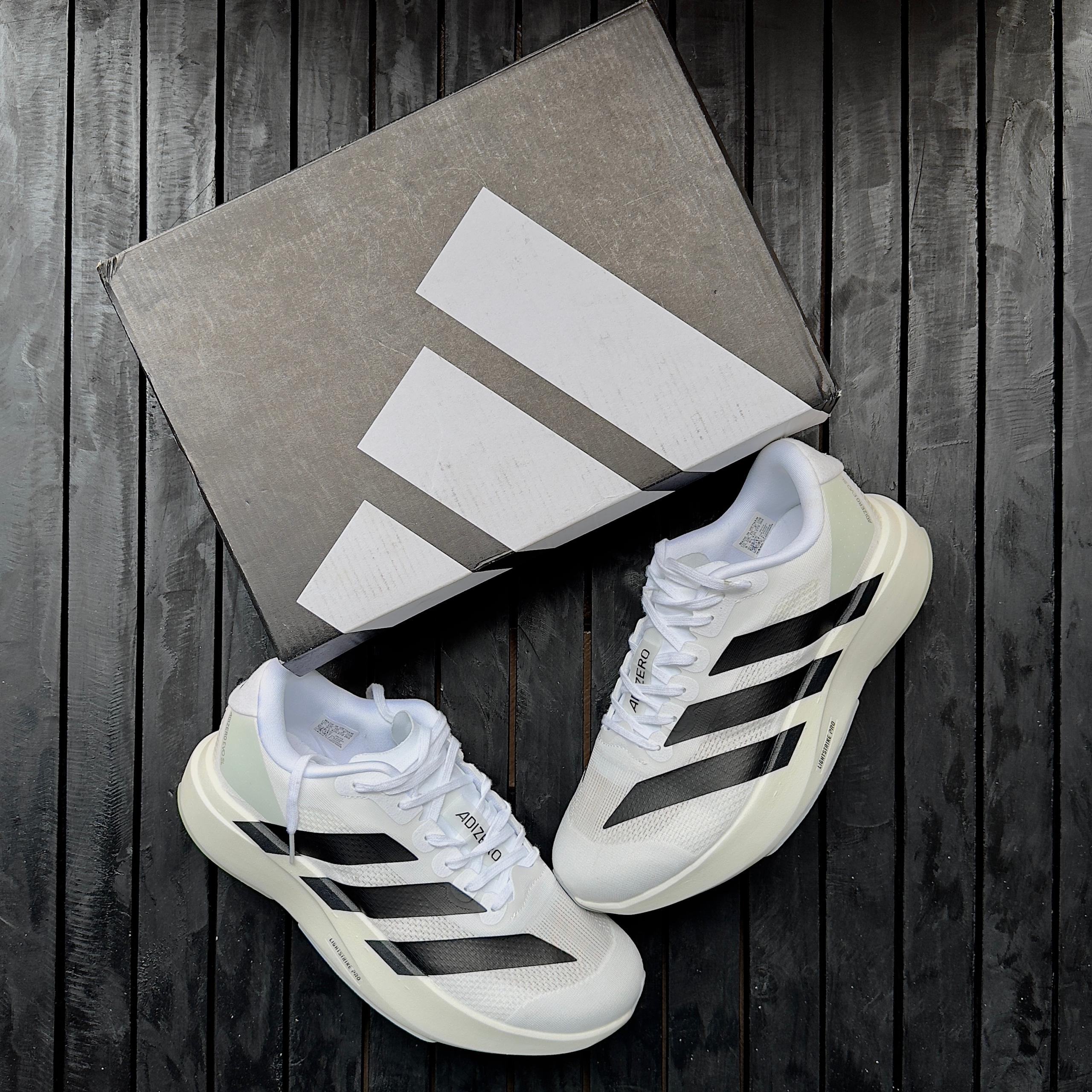THE ADIDAS ADIZERO EVO SL RUNNING SHOES IN CLOUD WHITE